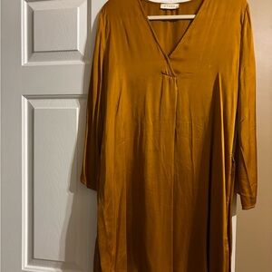 Boutique item; gold dress.
